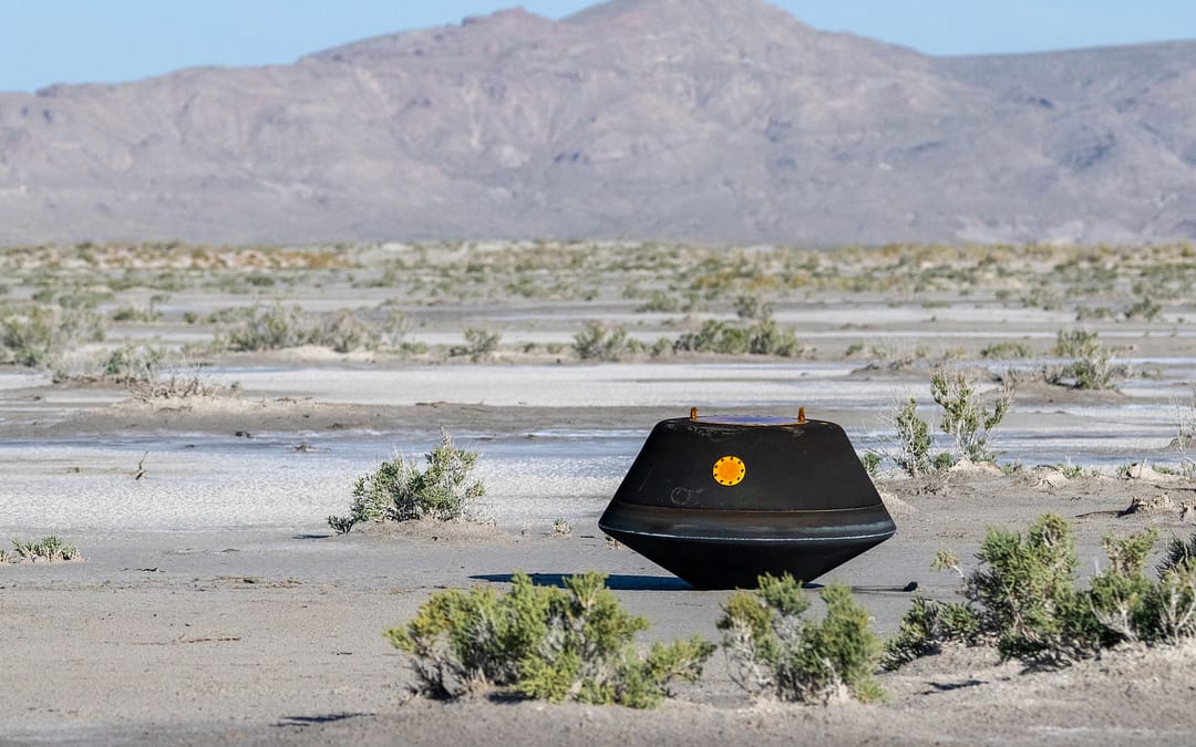 OSIRIS-REx sample return capsule sits in the Utah desert after landing with 250 grams of rocky dust from the near-Earth asteroid Bennu.